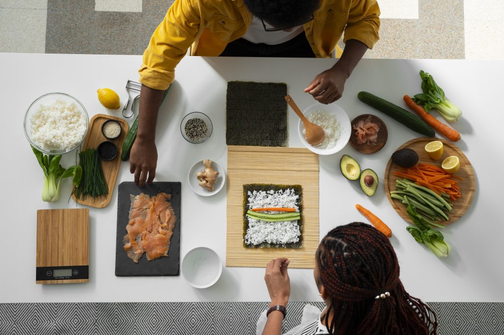 View people learning how make traditional sushi dish