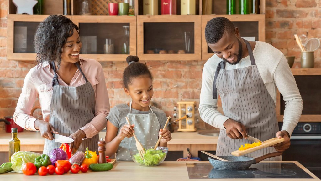 IStock Family cooking in kitchen 2.3.21 scaled